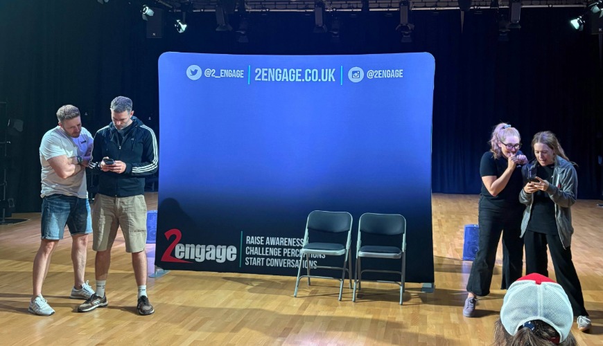 risking it all being performed by cast members in front of a 2engage set